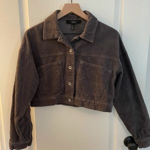 Grey cropped jacket.